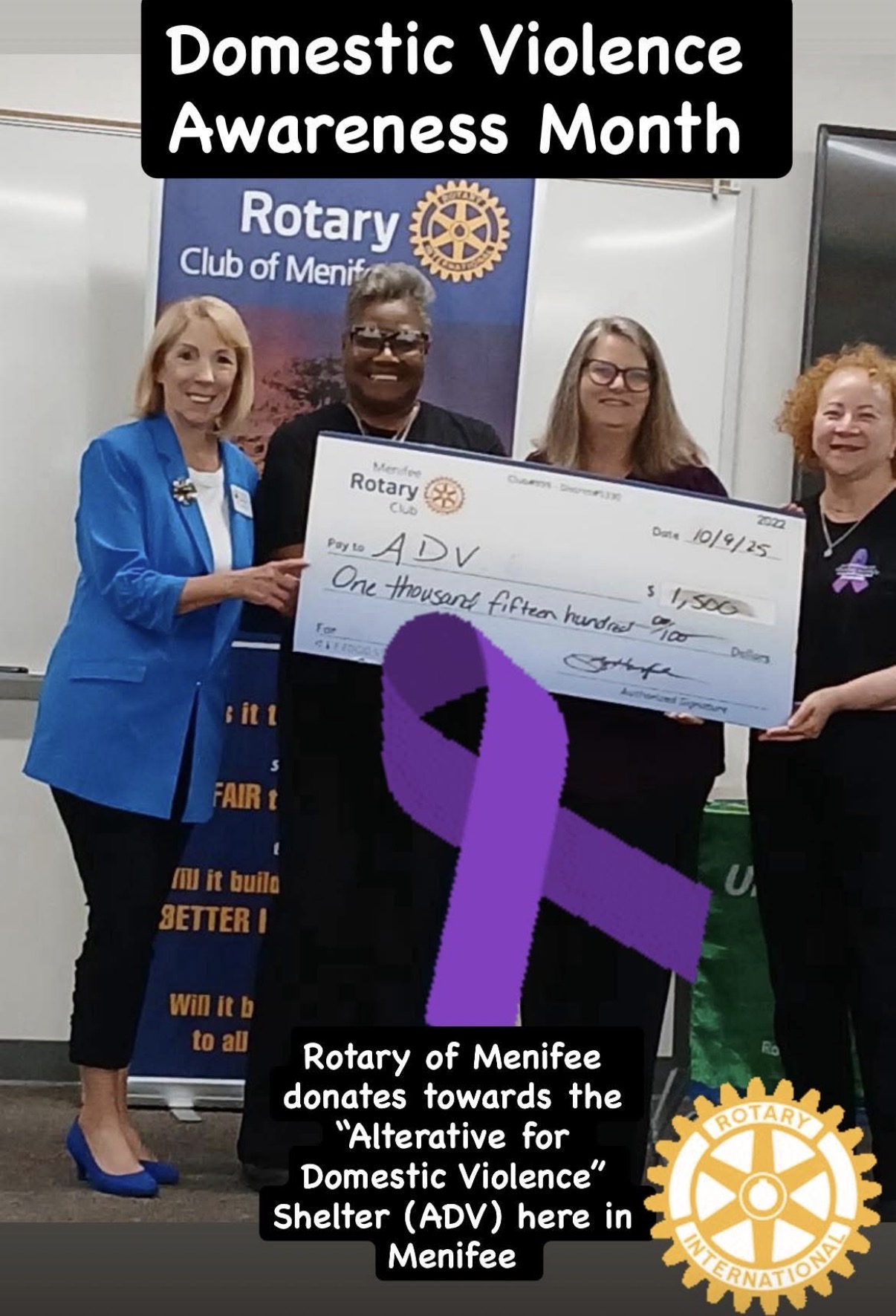 Vicki Carpenter with the Rotary Club of Menifee presenting a donation for Domestic Violence Awareness Month