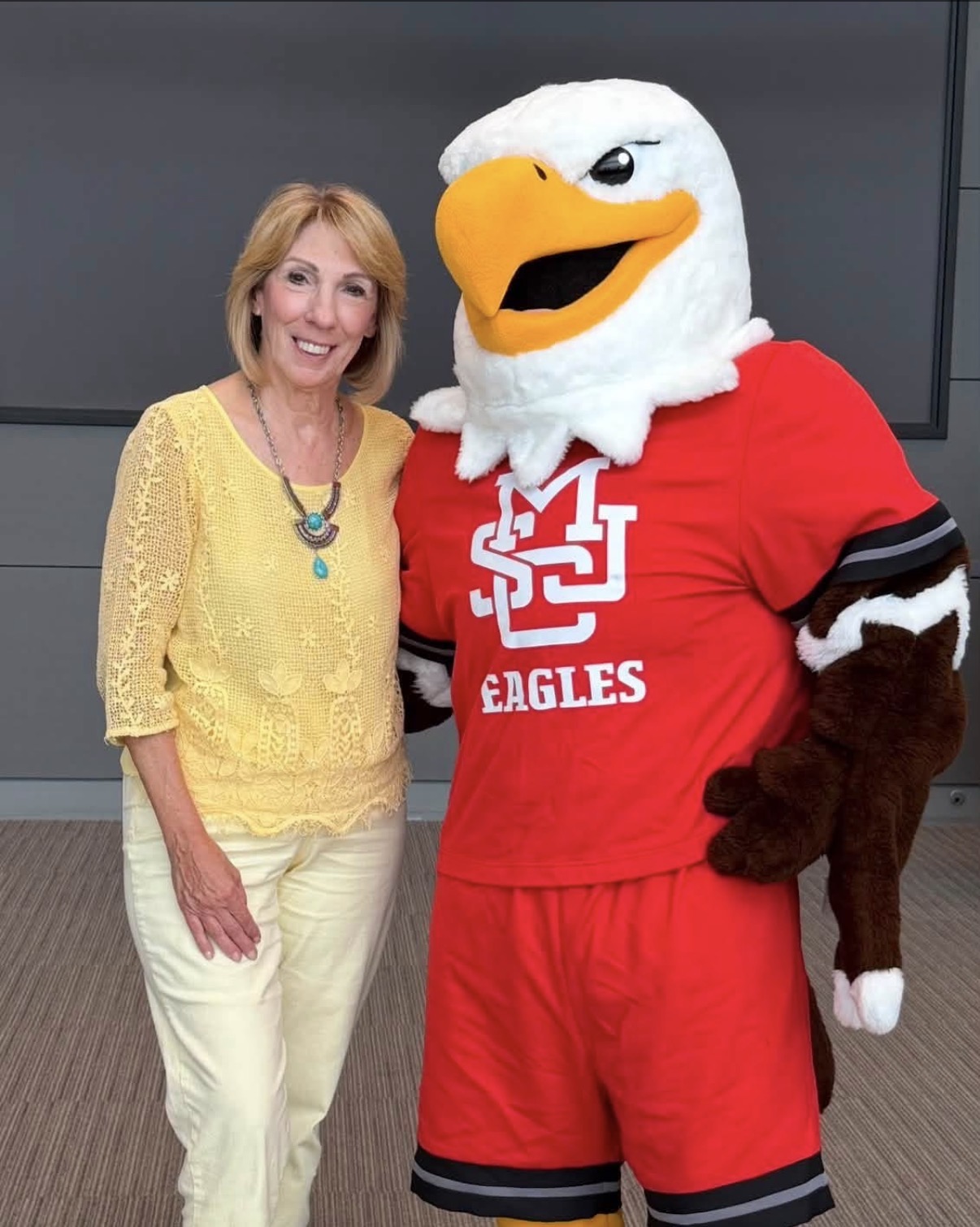 Vicki Carpenter with the MSJC Eagles mascot