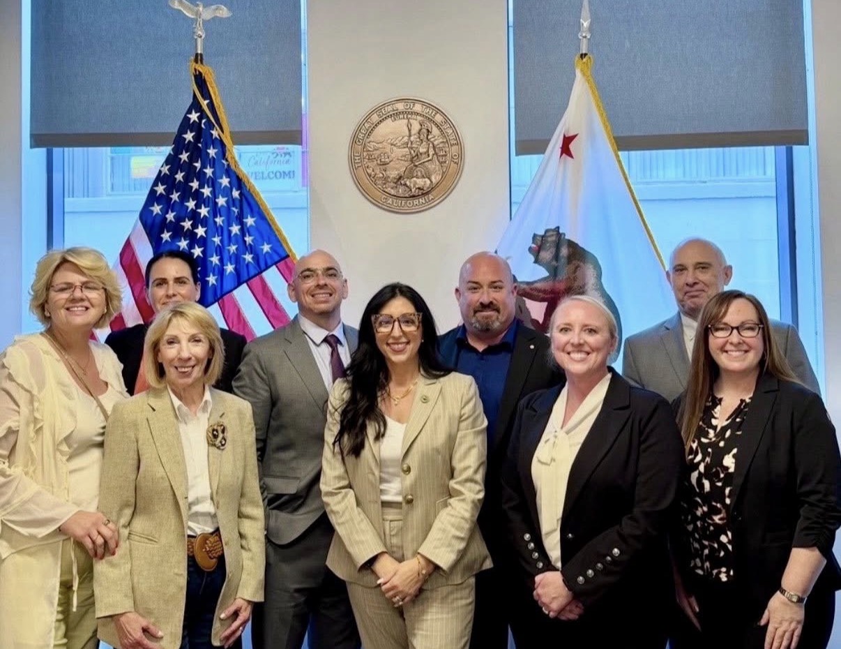 Vicki Carpenter with a group at a California state office